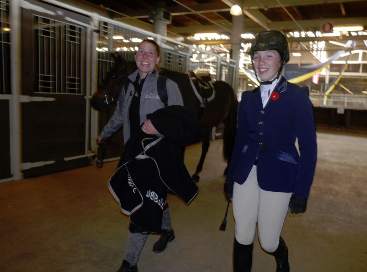 rider coats and boots at The Horse Show